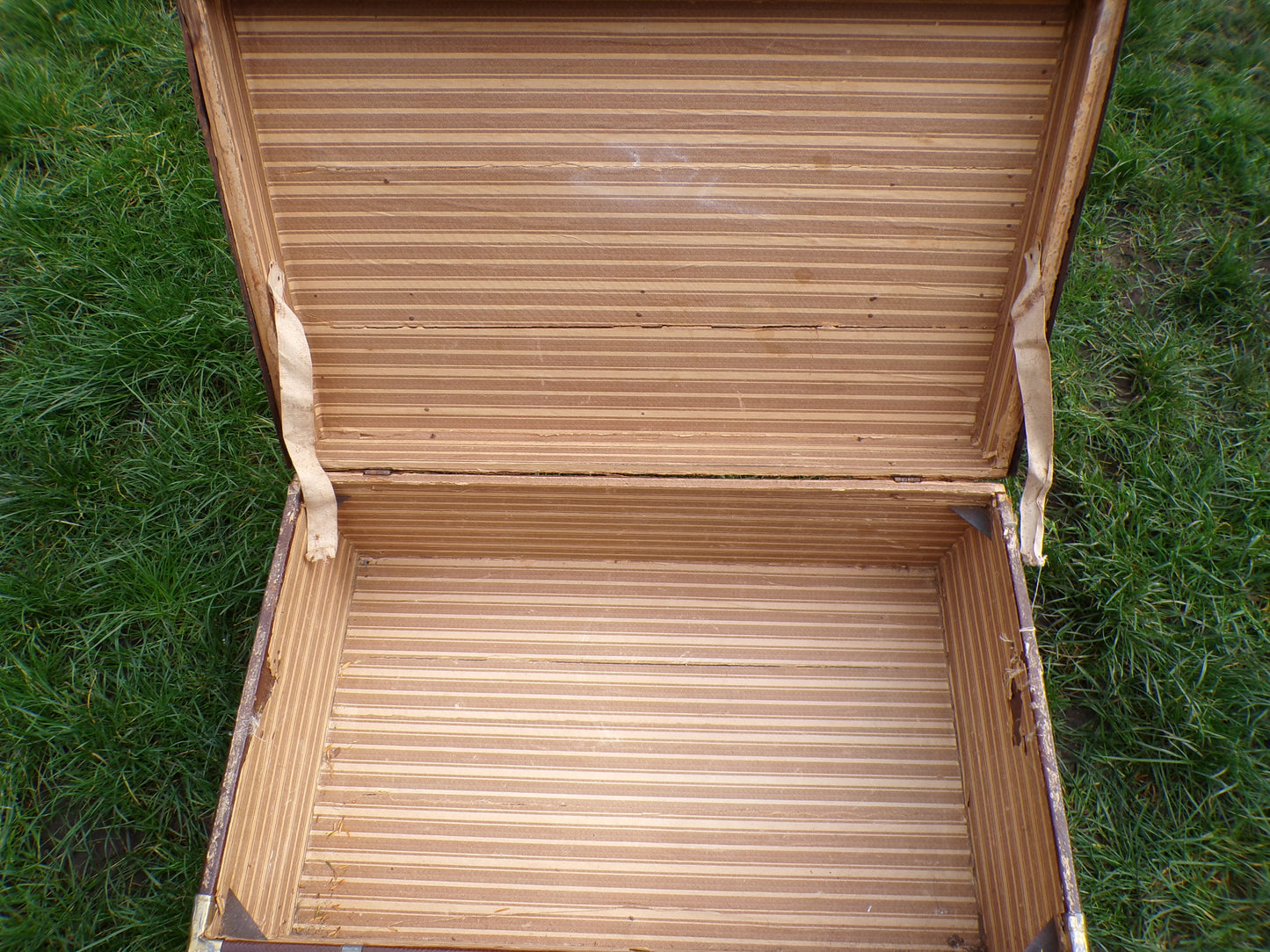 Vintage steamer trunk with flat lid