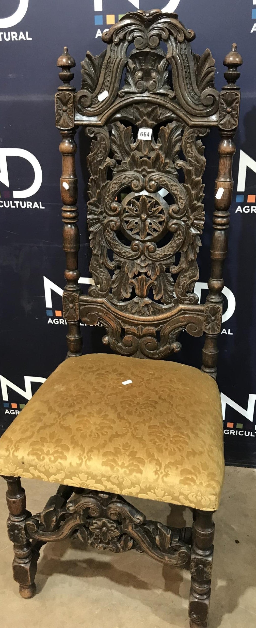 Heavily carved oak hall chair