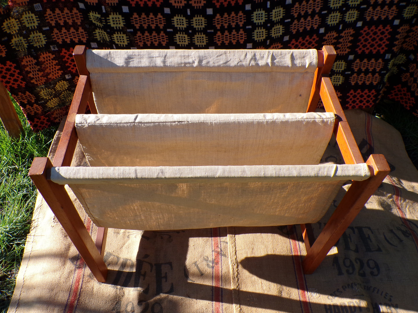 Mid century Danish teak and canvas magazine rack