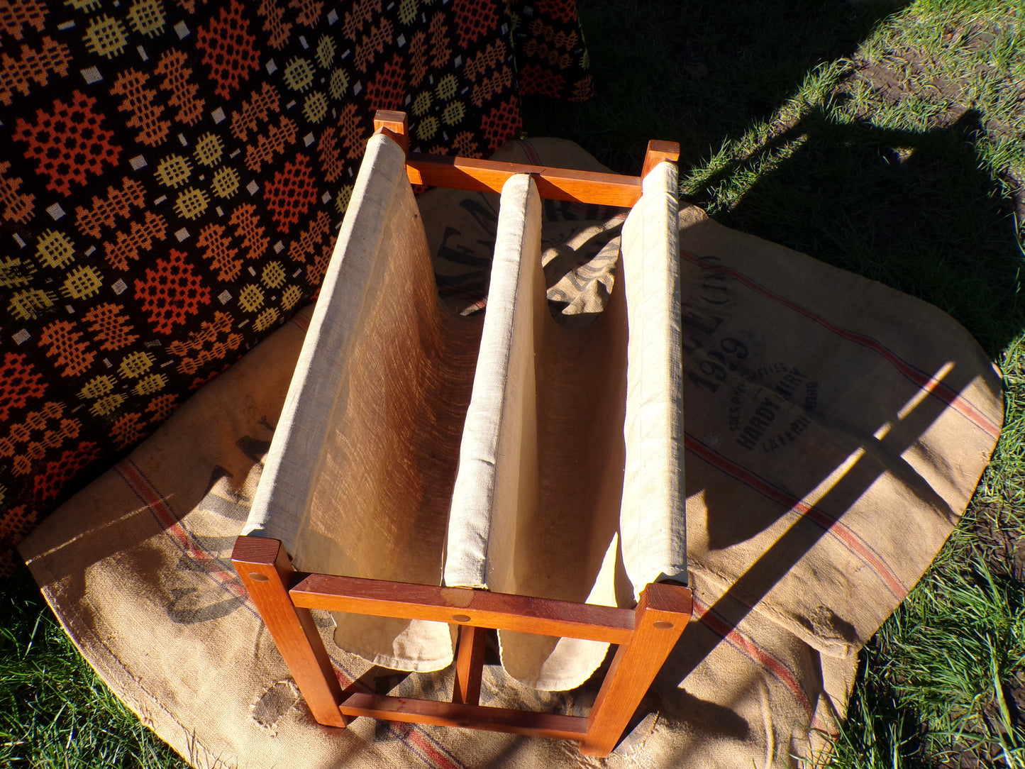 Mid century Danish teak and canvas magazine rack