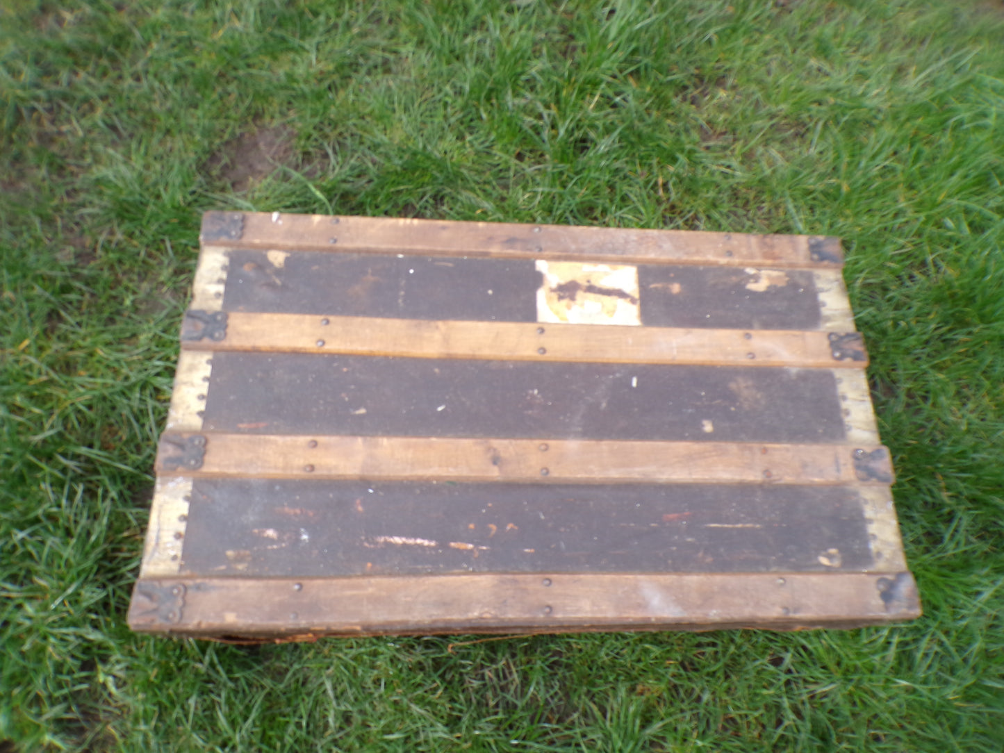Vintage steamer trunk with flat lid