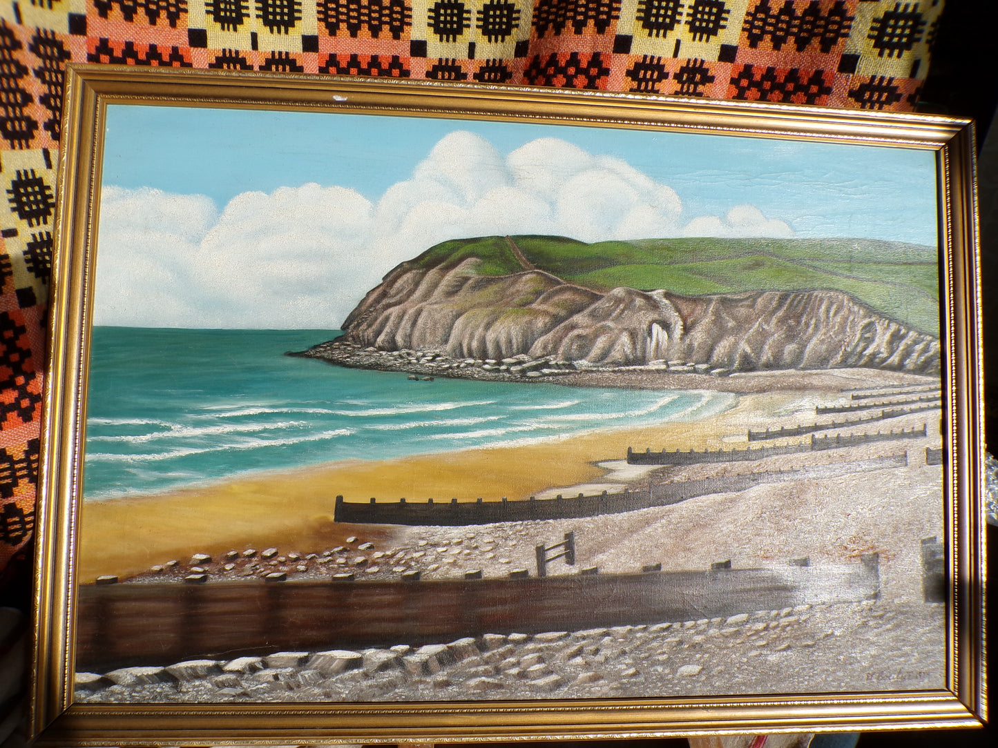 Signed acrylic on canvas seaside scene - probably Beachy Head but looks like Llandudno too.