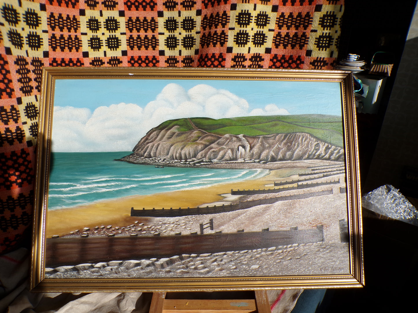 Signed acrylic on canvas seaside scene - probably Beachy Head but looks like Llandudno too.